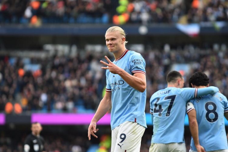 epa10219661 Erling Haaland of Manchester City celebrates after scoring a hat-trick during the English Premier League soccer match between Manchester City and Manchester United at Etihad Stadium in Manchester, Britain, 02 October 2022.  EPA-EFE/PETER POWELL EDITORIAL USE ONLY. No use with unauthorized audio, video, data, fixture lists, club/league logos or 'live' services. Online in-match use limited to 120 images, no video emulation. No use in betting, games or single club/league/player publications